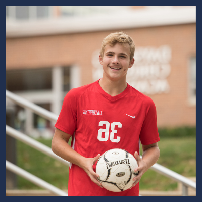 Male Christian High School Sports Team Player with Ball